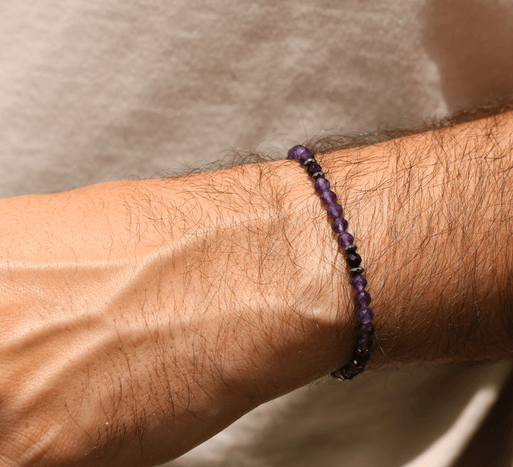 Amethyst Element bracelet worn alone in a close-up wrist view