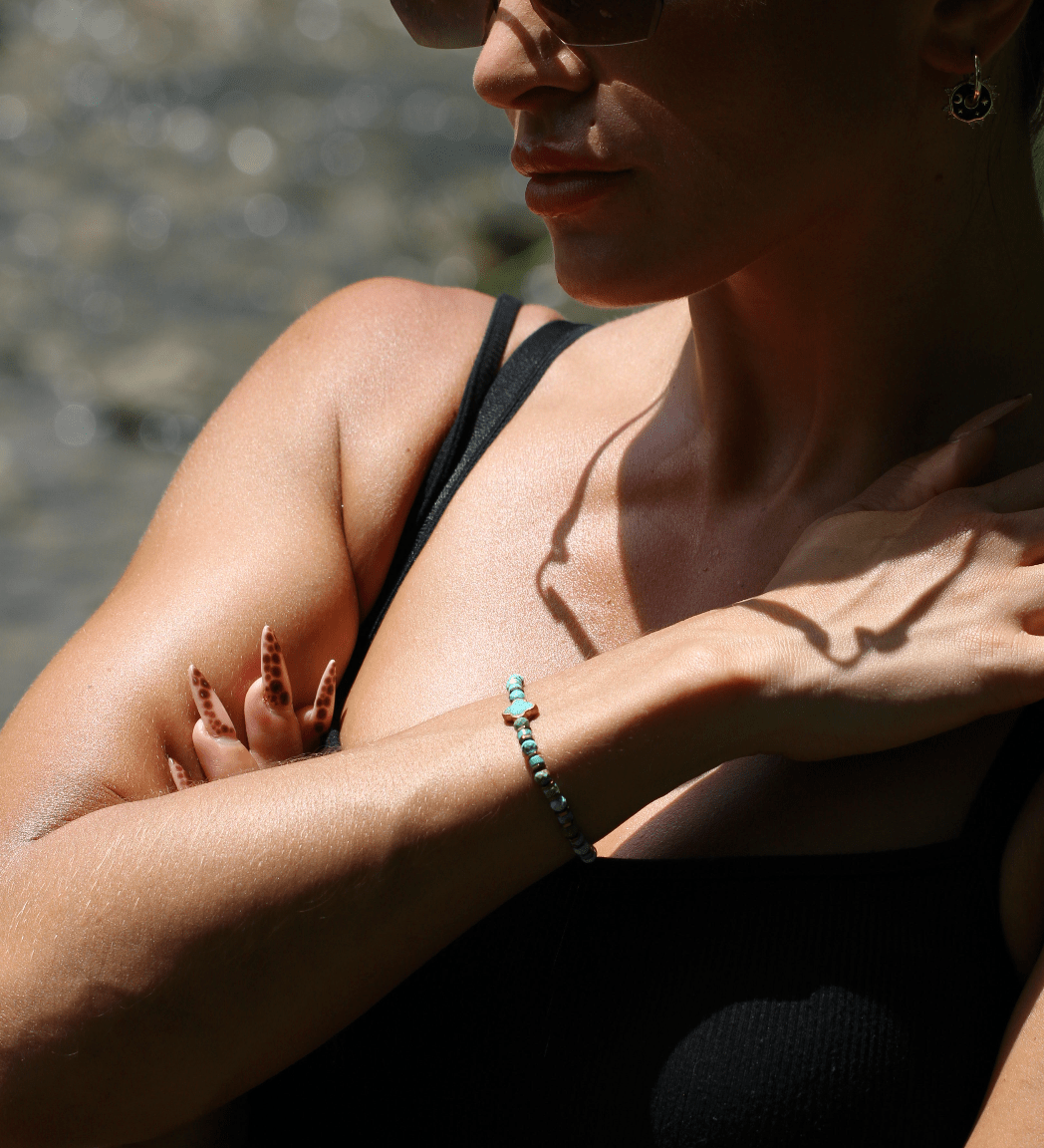 Patina Clove turquoise bracelet worn on a model&