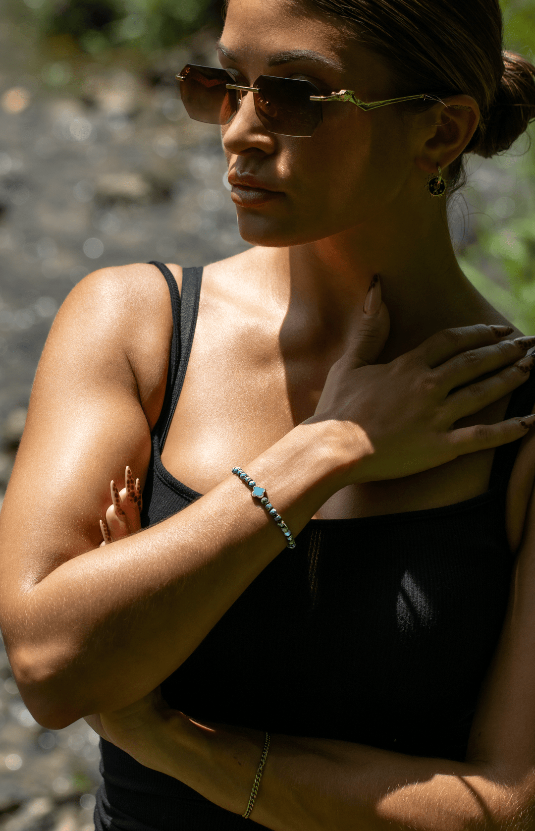 Patina Clove turquoise bracelet on a model&