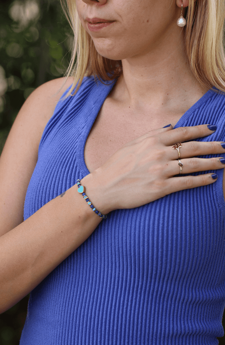 Patina Heart turquoise and apatite bracelet on a model&