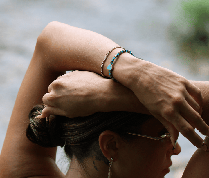 Patina Heart turquoise bracelet on a model&